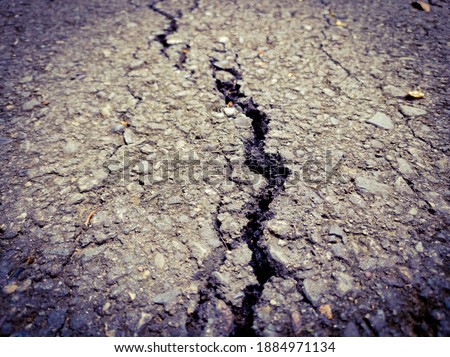 Similar – Cracks in asphalt Pothole