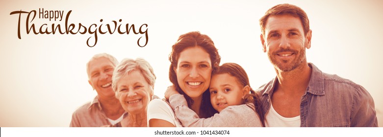 Illustration Of Happy Thanksgiving Day Text Greeting Against Portrait Of Family At Beach