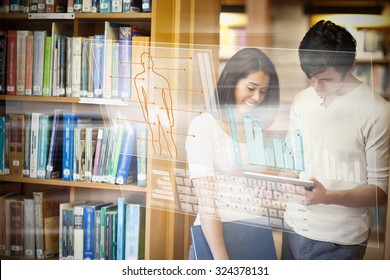 Illustration of human body with bar graph and keyboard against students looking on a tablet computer