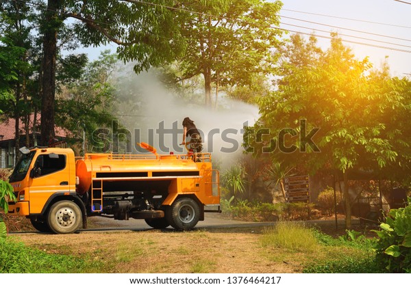 illustration of road\
cleaning and watering\
plants