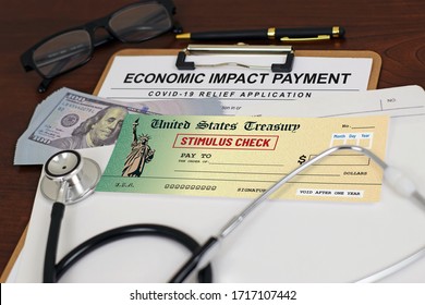 Illustrative Concept Image For Financial Relief Fund For Covid-19 (Coronavirus) Pandemic. Mock-up Of Financial Aid Application Form, Stimulus Check, And US Dollar.