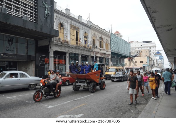 Illustrative\
Editorial. Havana, Cuba. May 31, 2022. Workers going to work by any\
means of transportation\
available.