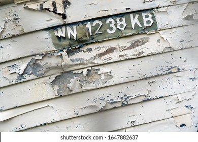 Ilwaco, Washington - 1/11/2020:  Paint Peeling From  The Side Of An Old Commercial Fishing Boat In Ilwaco, Washington