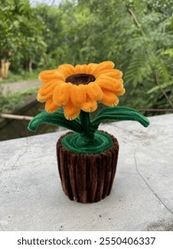 Im crafting a goldyellow sunflower from pipe cleaners, you can use as decoration