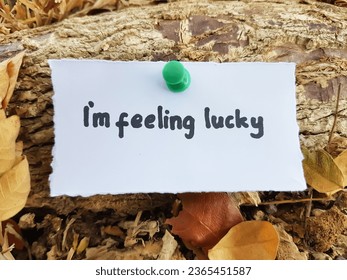 Im feeling lucky writing on wooden background. - Shutterstock ID 2365451587