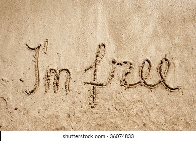 I`m Free Handwritten In Sand For Natural, Symbol,tourism Or Conceptual Designs