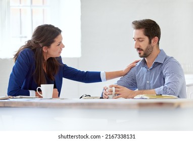 Im Here For You. Cropped Shot Of A Young Businesswoman Consoling Her Colleague Over Lunch.