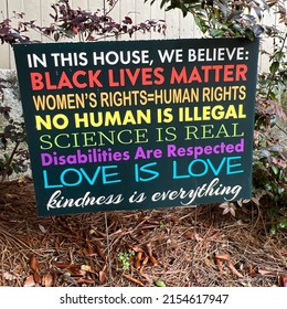 Im this house, we believe: Black Lives Matter, Women’s Rights=Human Rights, No Human is Illegal, Science is Real, Disabilities are Respected, Love is Love, Kindness is Everything. - sign in Atlanta