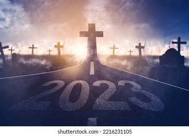 Image of 2023 number with Cross symbol at end road in the cemetery background - Shutterstock ID 2216231105