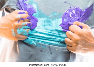 Shirt and hand dirty with paint in a dramatic superhero pose as creative artistic hero, painter, decorater, hobby worker, housework or artist concept and creative background