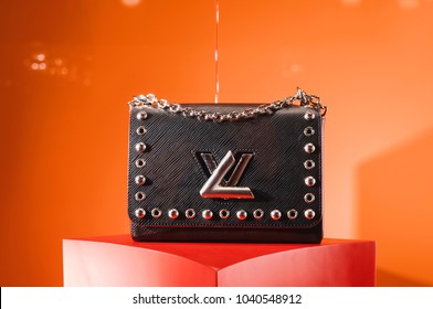 Louis Vuitton Logo - Louis Vuitton Icon with Typeface on White and Brown  Background 21059832 Vector Art at Vecteezy