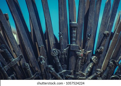 Warrior, Iron throne made with swords, fantasy scene or stage. Recreation of a medieval seat