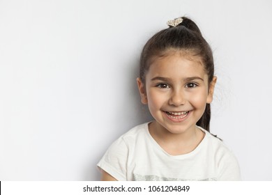 Portrait of a happy smiling child girl