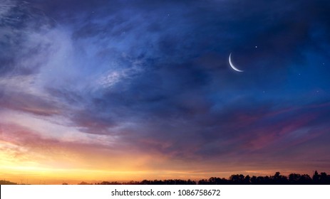  Crescent moon with beautiful sunset background . Generous Ramadan 