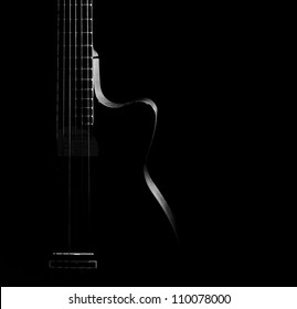 黒の背景にギターの曲線、