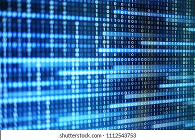 poder de los grandes datos. bit de información de código binario en la pantalla del monitor de la computadora. Texto de luz led número uno y cero. desenfoque desenfoque azul bokeh luz. conceptos de fondo de diseño gráfico de tecnología