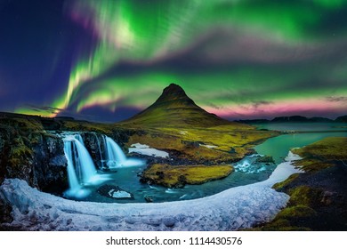 Northern Light, Aurora borealis at Kirkjufell in Iceland. Kirkjufell mountains in winter.