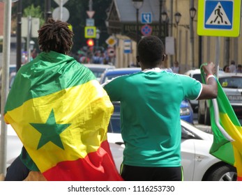Moscow, Russia - 19 June 2018: Football fans from Senegal in Moscow during the FIFA world Cup 2018. Senegalese fans celebrate the victory of the national team over Poland