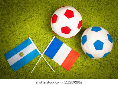 Football match between Argentina and France. Flag of Argentina on the football field. Flag of France with football swords. Football game. Team of Argentina against the team of France.