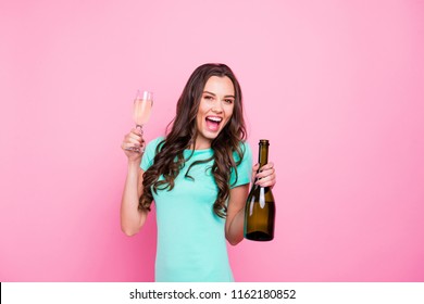Party time! Forever twenty-one! Portrait of charming, lovely brunettes with champagne in hands isolated on bright pink background