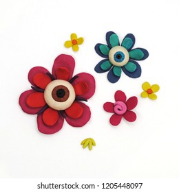 Set of several multicolored flowers. Plasticine illustration