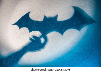 Shadow of a bat on the wall. Halloween. Batman. Concept.