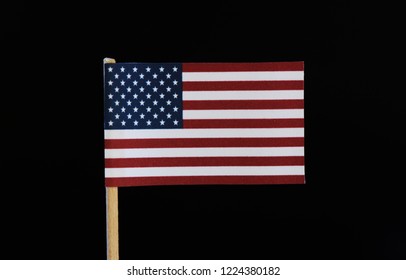 A official flag of united states Thirteen horizontal stripes alternating red and white in the canton, 50 white stars of alternating numbers of six and five per horizontal row on blue field.
