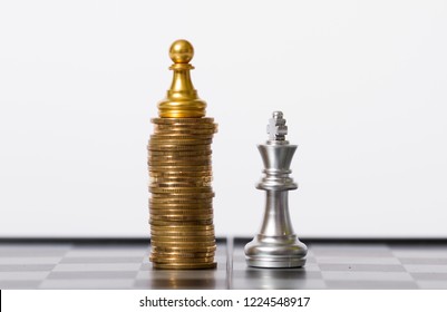 Chess pieces and gold coins, wealth growth and career success, achievement, economic status and social achievement