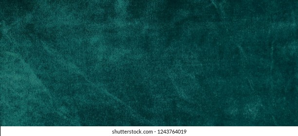velvet texture background dark green color. banner. expensive luxury, fabric, material, cloth.Copy space.