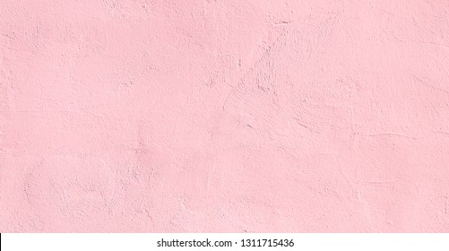 ビンテージ ライト ピンク プラスター壁のテクスチャです。パステルの背景。抽象的な塗られた壁の表面。デザインのコピー スペースと漆喰の背景