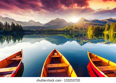 Mountain lake in National Park High Tatra. Dramatic overcrast sky. Strbske pleso, Slovakia, Europe. Beauty world.