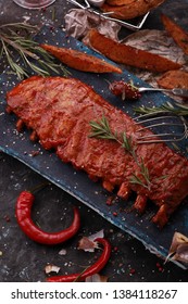 barbeque lamb fingers in grill sauce with chili and tomato 