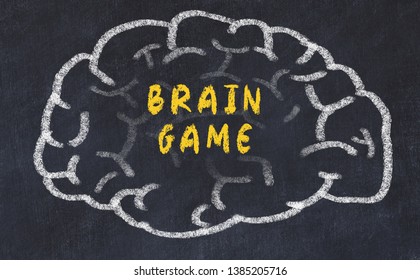 Chalk drawing of human brain with inscription brain game.