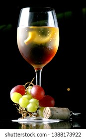The Bishop Cocktail is a red wine and cuban rum cocktail strained into ice-filled wine glass, and red wine, and garnished with an orange wheel.