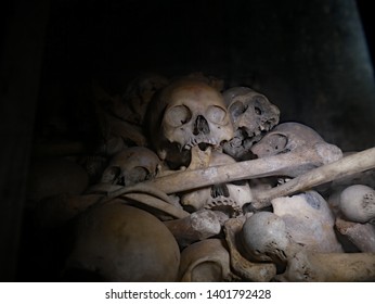 Skulls and bones in the killing caves of Cambodia. Phnom Sampeau, Battambang, Cambodia, 01-12-2018. 