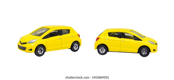 Group of shabby yellow cars model toy isolated on white background.