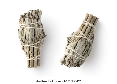 white sage smudge sticks used for spiritual incenses isolated on a white background, two different positions, top view	