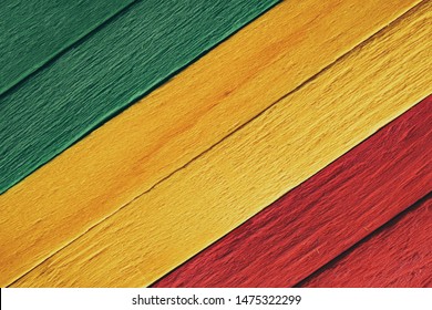 Background wood green, yellow, red old retro vintage style, rasta reggae flag