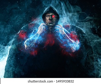 Mysterious man in black wear and steampunk mask with wings. Character wizard in robe from the future. Assassin with strong face expression. Fantasy book or computer game cover concept.