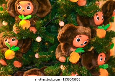 Christmas fir tree decorated with Russian 'Cheburashka' toys. 