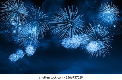 Abstract blue color firework background with free space for text. Variety of colors Mix Fireworks or firecracker burst collections