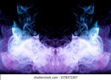 Dense multicolored smoke of blue and purple colors in the form of a skull, monster, dragon on a black isolated background. Background of smoke vape. Mocap for cool t-shirts
