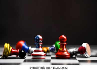 Print screen of flag on pawn chess of USA and China among others countries with black background.It is symbol of tariff trade war tax barrier between United States of America and China.-Image.