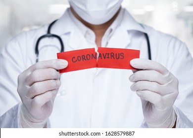Concept of coronavirus quarantine. MERS-Cov.
Novel coronavirus (2019-nCoV).Doctor with a stethoscope Tear the red paper with the word coronavirus.