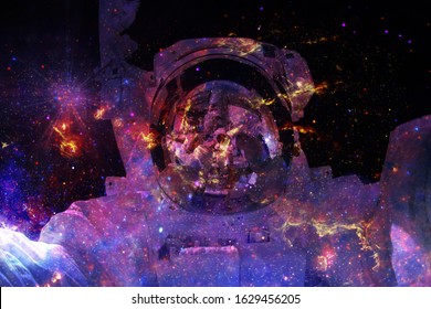 Astronaut at spacewalk. Cosmic landscape. Elements of this image furnished by NASA