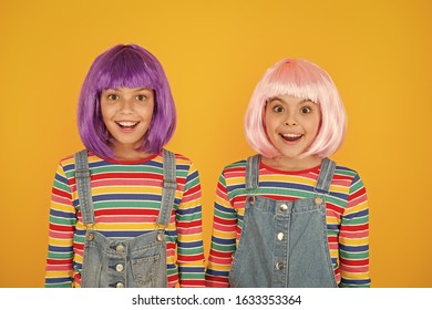 Anime convention. Happy little girls. Anime fan. Cheerful friends in colorful wigs. Anime cosplay party concept. Animation style characterized colorful graphics vibrant characters fantastical themes.