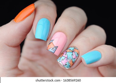 Bright manicure with print cat orange blue pink