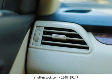 車のエアコン調整ボタン