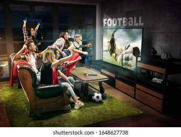 Group of friends watching TV, match, championship, sport games. Emotional men and women cheering for favourite team, look on fighting for ball. Concept of friendship, sport, competition, emotions.