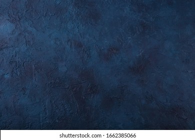 濃いネイビー ブルーの石のテクスチャ背景。上面図。スペースをコピーします。